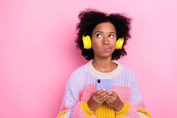 Closeup photo of teenager girl wear knitted sweatshirt listen music use bluetooth connection hmm...