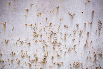 Texture of rusty iron, cracked paint on an old metal surface. Sheet of rusty metal with cracked and peeling paint, background for design with copy space.
