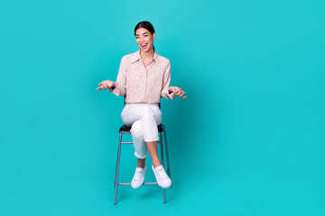 Full body photo of young chinese lady sit stool chatting job interview wear stylish smart casual...