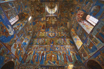 Fototapeta na wymiar Painted walls and dome inside the church of Rostov Kremlin, Russia