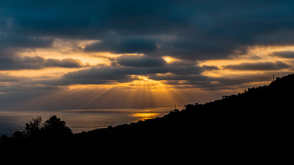 Claudy sunset, with sunshines over the sea  