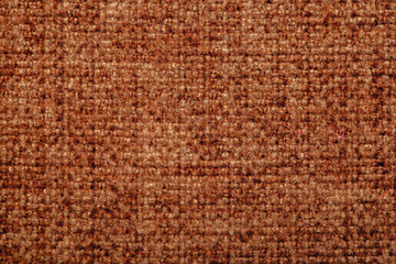 Close-up fabric swatches as a background. The texture of the material with patterns of weaving close-up. Upholstery fabric for interior decoration.