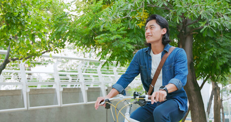 asian man commuting