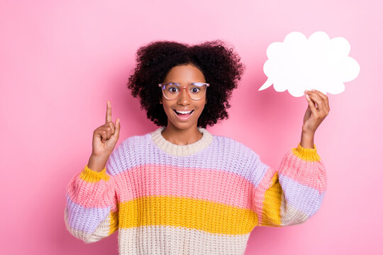 Photo of young beautiful impressed kid girl finger direct up genius idea hold paper bubble finally eureka isolated on bright pink color background
