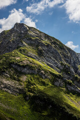Green mountain landscape with clouds