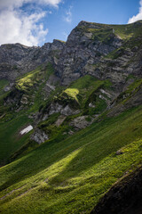 Green mountain landscape with clouds