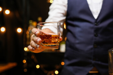 Bartender pouring Whiskey, on  bar,