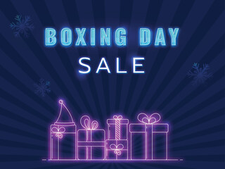 Boxing Day Sale Font With Gift Boxes In Neon Effect And Snowflakes On Blue Rays Background.