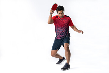 Portrait of sports man male athlete playing table tennis isolated.