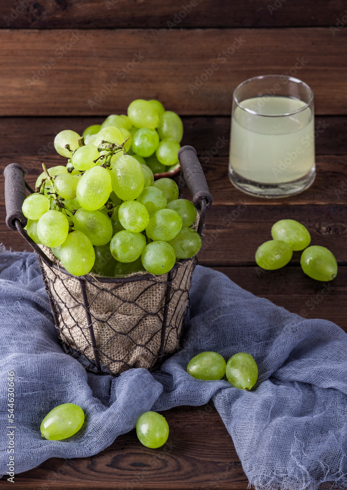 Wall mural fresh vitamin-containing fruit green grapes