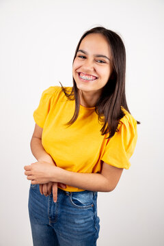 Portrait of a laughing teenager girl with metal orthodontics