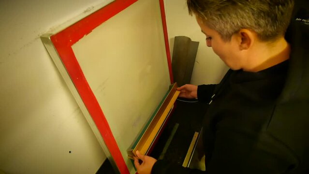 coating screen printing screens in dark room