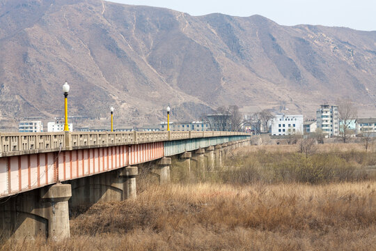 TUMEN, JILIN PROVINCE, CHINA - April 2008: road bridge to Namyang, in North Korea, border crossing for vehicles, Yanbian Korean Autonomous Prefecture, home to an important community of Korean origins