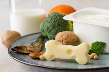 Bone shaped cheese and bone strengthening foods products, concept osteoporosis and prevention