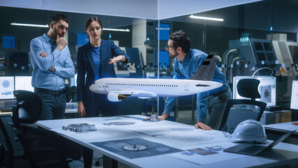 Aeronautics Factory Office Meeting Room: Team of Diverse Engineers and Managers Work on an...