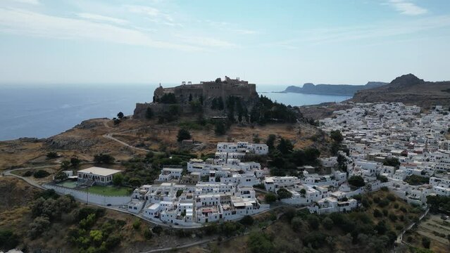Lindos is a town on the Greek island of Rhodes. It&rsquo;s known for its clifftop acropolis, which features monumental 4th-century gates and reliefs from about 280 B.C.