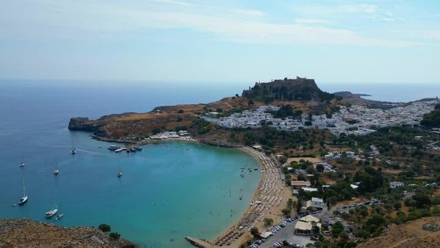Lindos is a town on the Greek island of Rhodes. It&rsquo;s known for its clifftop acropolis, which features monumental 4th-century gates and reliefs from about 280 B.C.