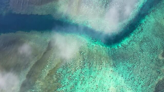 An Aerial View Of The Great Barrier Reef, Off The Coast Of Queensland In Northeast Australia, Is The Largest Living Organism On Earth, Visible Even From Space. Ecosystem With A Length Of 2300 Km