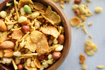 Chevra snack. Made from chickpea flour with peanuts, cornflakes, corn kernels. Crackles or known as slangetjies in South Africa 