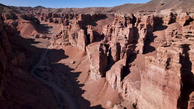 The multicolored rock layers of Charyn Canyon are the product of different stages of sediment deposits.