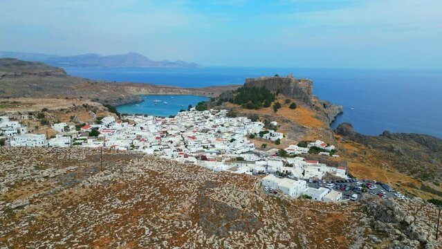 Lindos is a town on the Greek island of Rhodes. It&rsquo;s known for its clifftop acropolis, which features monumental 4th-century gates and reliefs from about 280 B.C.