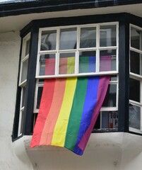 rainbow flag ,gay pride flag,LGBT pride flag is a symbol of lesbian,gay,bisexual and trangender on the window

