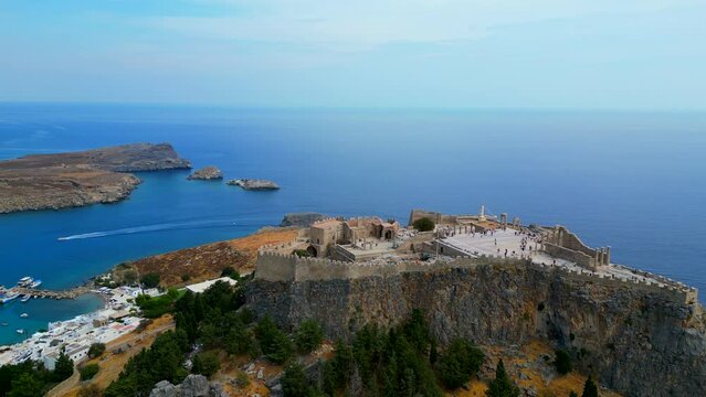 Lindos is a town on the Greek island of Rhodes. It&rsquo;s known for its clifftop acropolis, which features monumental 4th-century gates and reliefs from about 280 B.C.