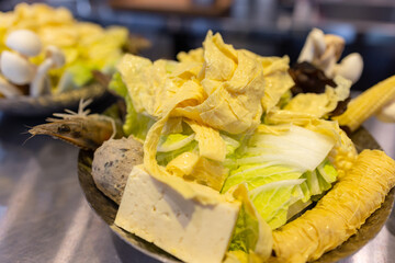 Fresh raw vegetable in hot pot restaurant