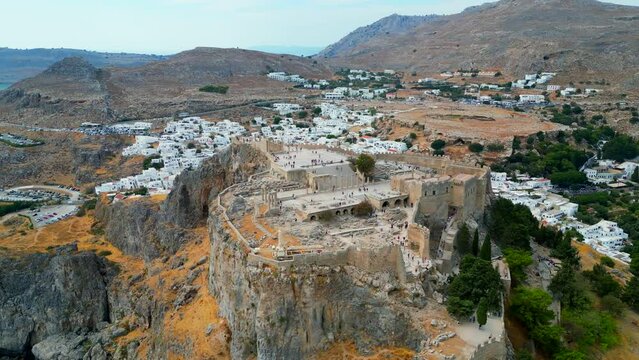 Lindos is a town on the Greek island of Rhodes. It&rsquo;s known for its clifftop acropolis, which features monumental 4th-century gates and reliefs from about 280 B.C.