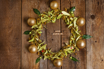 Christmas composition with linden blossom on old wooden table - 544662053