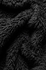 Black fur background for content or banners. There is space for text.