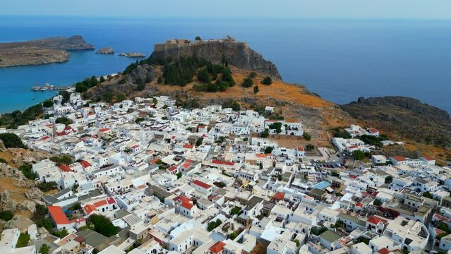Lindos is a town on the Greek island of Rhodes. It&rsquo;s known for its clifftop acropolis, which features monumental 4th-century gates and reliefs from about 280 B.C.