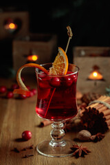 Christmas drink with spices, orange, and cranberries.