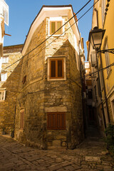 A quiet backstreet in the historic medieval centre of Piran on the coast of Slovenia

