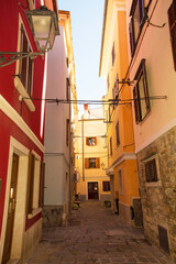 Fototapeta na wymiar A quiet backstreet in the historic medieval centre of Piran on the coast of Slovenia 