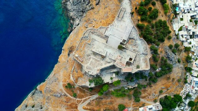 Lindos is a town on the Greek island of Rhodes. It&rsquo;s known for its clifftop acropolis, which features monumental 4th-century gates and reliefs from about 280 B.C.