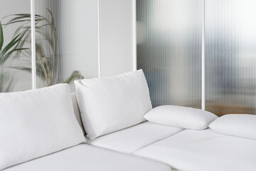 comfortable white folding sofa for rest in living room