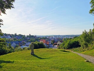 View from the castle to the town of Malenovice, Zlin Region, with a statue of the local Count Jaroslav Sternberg