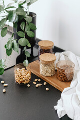 storage food products in glass containers on countertop at kitchen