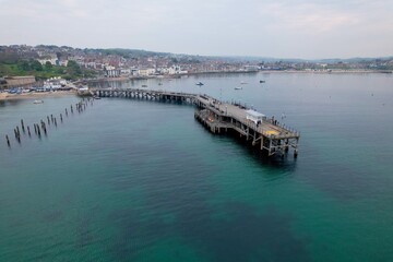 Swanage pier .Dorset  town UK drone aerial view.