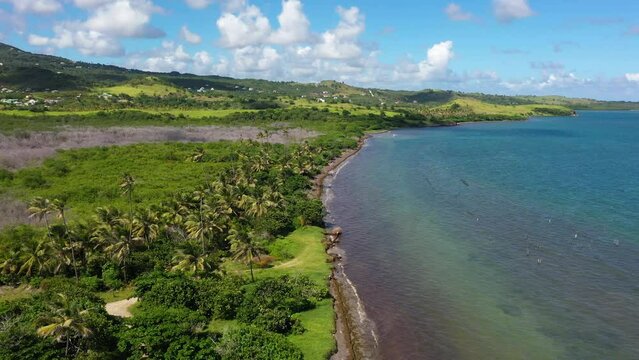 Drone video pushing in over the Saint Lucia beachfront.