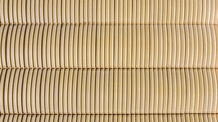 Aerial view on the roof of an industrial warehouse in sheet metal. Ideal for textures and patterns.