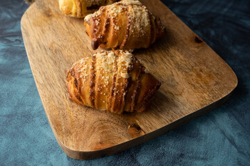 Fresh traditional polish pastry with poppy-seed filling and nuts. St. Martin's croissant, Rogal marciński or świętomarciński. - obrazy, fototapety, plakaty