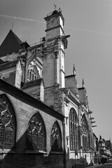 stone gargoyle and Turret Gothic facade of the Medieval church in  Troyes, France