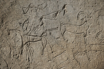Cave art pattern made of ancient wild animals, horses and hunters. Rock paintings. Hunting scenes....