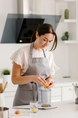 woman confectioner prepares a cake in the kitchen at home. Home baking for the whole family. High quality photo