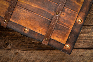 retro decorative case or storage box on wooden rustic table, top view