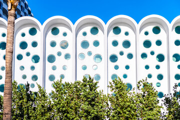 Abstract exterior architecture facade of art deco blue and white windows vintage residential...