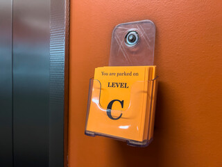 Close up view of slips of paper to take for reminding yourself where you parked in a parking garage