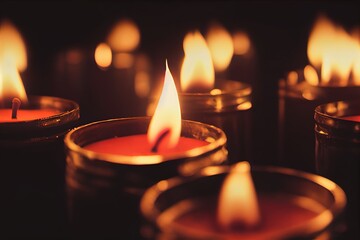 Many burning candles with warm colors. Very focused. Dark background.